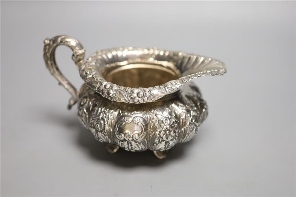 A George IV Irish silver squat melon shaped cream jug, James Le Bas, Dublin, 1828, height 11.2cm, 12oz.